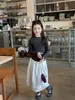 Falda Midi de Otoño con Adorno de Encaje para Niñas Aimo Beibei para Niños Medianos y Mayores Estilo Artístico Blanca Plisada de Línea A Larga