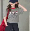 Camiseta de Verano para Niñas 2026 Nuevo Estilo Versión Corta Delgada para Niños Mayores, Camiseta Gris de Algodón Puro con Dibujos para Niñas