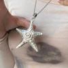 Collar con colgante de estrella de cinco puntas dulce y cool transfronterizo de Europa y Estados Unidos, personalidad retro exagerado, collar de estrella de mar para mujer al por mayor
