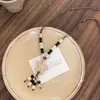 Collar Colgante de Flor con Cuerda de Cera y Cuentas de Madera Estilo Étnico Temperamento Retro Cadena para Clavícula Nicho Lujo Ligero Joyería de Gama Alta para Mujeres