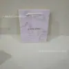 Labial Azul Perfume Rosa Caja de Regalo Bolsa de Regalo Empaque Caja Beso de Mariposa Bolsa de Regalo Caja de Regalo Edición Navideña