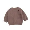 Suéter tejido de otoño/invierno para bebé y niño pequeño con botones en el hombro, suéter de cuello redondo color avena para niños, top moderno para bebés niños y niñas