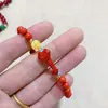 Pulsera de cinabrio natural para mujer, pulsera de cera de abeja, arena roja, ruyi, joyería retro nueva china, este año de vida, transferencia, venta al por mayor, directo