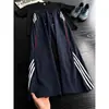 Pantalones casuales de estilo callejero americano con tres rayas para hombre, pantalones deportivos de secado rápido para otoño con un diseño genial, pantalones rectos holgados