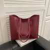 Bolsa de Gran Capacidad para Mujer 2026 Primavera Nuevo Estilo Bolso de Hombro Sencillo Moderno Este Año para el Trabajo y los Viajes Diarios Bolso Tote de Color Sólido