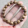 Venta al por mayor de fábrica Vietnam hilo de mano sumergido cuentas de arena blanca madera sumergida Wen juega círculo único 10 mm joyería de mano para mujer textura de piel de tigre