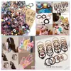 Venta de liquidación de gomas para el pelo, accesorios para el pelo y pinzas para el pelo; ofertas al por mayor de Yiwu