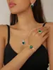 Moda Europea y Americana Colgante de Cristal en Forma de Corazón Collar para Clavícula Pendientes Anillo Set de Cuatro Piezas Corazón de Melocotón Accesorios de Boda para Novia