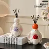 Ornamento aromático em formato de coelho de orelhas caídas segurando uma flor com porta-velas, adequado para quarto, escrivaninha e decoração de casa, criando uma atmosfera aconchegante, uma ótima decoração de presente para casa