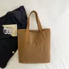 Bolsa de Lona Versátil para Estudante Cor Sólida Patchwork Fashion 2026 Nova Textura Casual Bolsa de Ombro Tote Grossa Feminina