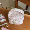 Bolsa de cosméticos Mins Nueva de aspecto elegante, de nicho, de gran capacidad, Bolso de mano portátil, Bolsa de almacenamiento de jacquard, Exquisita bolsa de aseo