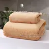 Toalha de banho de flanela coral transfronteiriça cor sólida grossa absorvente grande para adulto toalha de banho pode ser adicionada toalha de publicidade conjunto de toalhas de banho