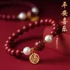 Corda vermelha de cinábrio de lótus pulseira de cinábrio trançada novo Lótus Hetian Jade marca Fu corda de mão de aprendizado boa sorte