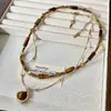 Elegante Collar Colgante de Piedra Ojo de Tigre con Perlas de Doble Capa para Otoño/Invierno Estilo Vintage Cadena para Suéter de Celebridad de Internet