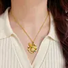 Nuevo colgante de peonía y fénix con exquisito diseño calado, luciendo lujoso esmalte y técnicas de tallado tradicionales, un collar perfecto como regalo para novios, novias o mejores amigos