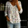 Nova camisa feminina de manga comprida com botões e gola V estampada transfronteiriça, elegante e estilosa para o trabalho, top casual único e moderno