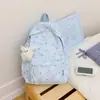 Mochila de novo estilo para estudantes do ensino fundamental II e médio, versão coreana estampada casual, estilo niche ins, bolsa para laptop de estudante com tema de floresta