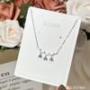 Collar de plata de ley 925 con borla de lirio de los valles para mujer, diseño clásico de moda, cadena de clavícula con campana sonriente de nicho.