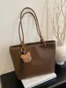 Bolso pequeño transfronterizo para mujer, bolso tote texturizado, nuevo bolso de mano simple vintage, bolso de hombro y axila versátil con bloques de color