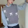 Colete de Tricô Fofo com Laço para Meninas 2026 Outono Novo Estilo Tamanho Petite Suéter que Diminui a Idade Colete para Camadas