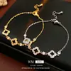 Pulseira Flor de Grama da Sorte Vazada em Zircônia Moda para o Dia a Dia Versátil Pulseira Exquisita Temperamento Senso Avançado Pulseira de Nicho