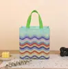 Bolsas laminadas no tejidas más vendidas transfronterizas, serie colorida para niños, bolsas para snacks de regalo navideño, bolsas de regalo para cumpleaños infantiles