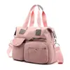 2026 Nuevo Estilo Bolso de Hombro para Mujer Estilo Europeo y Americano Bolso Cruzado de Nylon para Mamá Bolso de Viaje de Gran Capacidad Bolso Tote