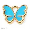 Accesorios para joyería DIY más vendidos a nivel transfronterizo: colgantes, pulseras, pendientes, collares de la serie flor y mariposa, y nuevos dijes para llaveros