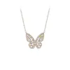Joyería Transfronteriza Europea y Americana Elegante Cadena para Clavícula de Circonita Cadena de Collar con Colgante Chapado en Oro Real Cadena de Collar de Mariposa Hueca para Mujer