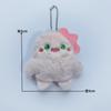 Colgante de monstruo de peluche de dibujos animados, lindo monstruo de tres ojos, bolso de estudiante de ojos grandes, muñeca, máquina, muñeca, venta al por mayor