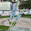 Fabricantes de flores de simulación para bodas azul claro nueva decoración de base de fila de flores guía de camino de boda flor artificial al por mayor
