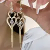 Pendientes de nudo permanente concéntrico, elegantes y a la moda, de lujo ligero, nuevos y modernos, pendientes largos con borla elegantes para mujer 2022