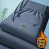 Fabricante Original 2025 Pantalones Deportivos para Hombre Otoño e Invierno Nuevos Rectos Deportivos Versátiles Forrados de Felpa Engrosados Modernos Pantalones de Chándal