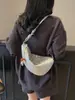 Bolsa Croissant Trançada para Mulheres 2026 Novo Estilo Elegante e Estiloso Bolsa de Ombro Transversal Feminina Formato de Croissant