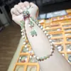 Nova corrente de cristal para celular estilo chinês, pingente de celular com toque de luxo, acessório de cordão de contas requintado, ornamento pendurado anti-perda para mulheres