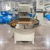 Máquina selladora de blísteres automática de plato giratorio, Máquina de empaquetado en tarjeta de papel de un solo lado con mano mecánica, Máquina de blíster para velas