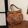 Bolsa Grande Capacidade Transfronteiriça para Mulheres Verão 2026 Nova Versátil Moda Tendência Bolsa de Ombro Bolsa Tote Casual Retrô
