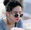 Ve a lugares ventosos Xu Hongdou con gafas de sol gafas de sol redondas polarizadas para mujer anti-ultravioleta se pueden combinar con miopía