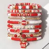 Pulsera de Rugby Transfronteriza Europea y Americana de Gran Venta Accesorios de Aleación con Goteo de Aceite Corazón de Cristal Estrella de Cinco Puntas Pulsera Elástica de Amistad