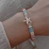 Pulsera de cuentas con forma de cachorro de estrella de mar, dulce y fresca, con temperamento femenino, pulsera de nicho, linda pulsera de flores de gato de dibujos animados, venta al por mayor