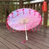 Paraguas clásico de papel con aceite de pétalos y borlas para danza de niñas, accesorios de la dinastía Han, paraguas para fotografía, decoración de cheongsam, paraguas para niños.