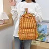 Nova mochila xadrez retrô, moderna e única, grande capacidade, adequada para alunos do ensino fundamental e médio, estilo coreano, mochila versátil