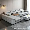 Sofá de cuero gris oscuro de lujo ligero estilo italiano con ribete naranja, respaldo segmentado y chaise longue para sala de estar del hogar