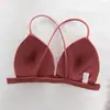 Ropa interior estilo japonés para mujer comercio exterior sujetador de copa triangular francés espalda bonita sujetador con botón delantero tirante cruzado tirante de espalda bonito transfronterizo