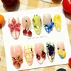 30 piezas de uñas postizas de moda transfronteriza, con diseño floral 3D, forma de almendra, piezas de arte de uñas de cereza exquisitas, en stock para venta al por mayor