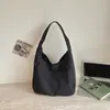 Bolso de hombro de lona estilo coreano ins personalizado de moda 2026 nuevo modelo de verano de gran capacidad ligero casual para el día a día