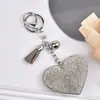 Nuevo Estilo Chanel Corazón de Melocotón Pedrería Cuero Llavero Borla Colgante Llavero Corea del Sur Franela Diamante Llavero