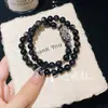 Nuevo Estilo Chino Pulsera de Obsidiana Plateada Natural Pixiu de la Fortuna Doble Círculo Apilado Estilo Pareja Hombres y Mujeres Pulsera Estilo Chino Venta al por Mayor