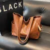 Bolso de Hombro PU de Alta Textura Estilo Coreano para Mujer 2025 Nuevo Color Sólido Gran Capacidad Bolso de Mano Versátil Bolso Tote para Viajes