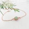 Atacado de fábrica pulseira de jade Hetian imitação banhada a ouro 24K pulseira redonda de pedra hibisco verde-amarelo pulseira de pedra uva Mori